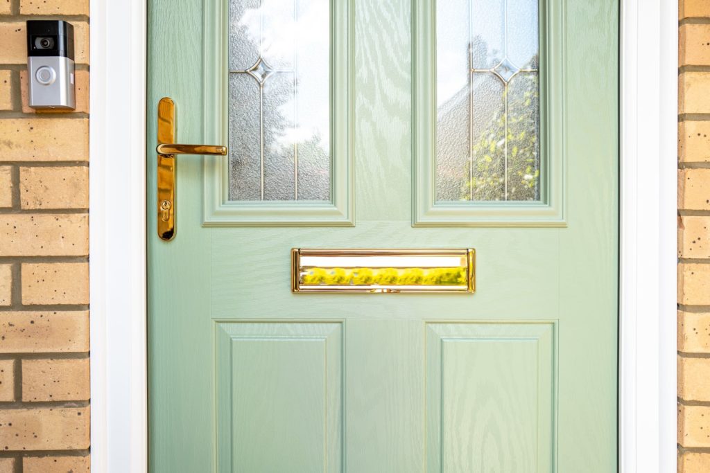 A green composite door for a home in South London.